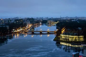 Foto op Plexiglas The view from the heights on the river Neva  in the evening ligh © toshket