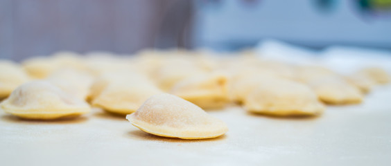 Process of making ravioli, pelmeni or dumplings with meat on woo