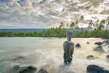 Ancient tiki standing in Pu'uhonua O Honaunau National Park, Big Island, Hawaii