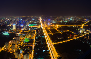 Fototapeta na wymiar Aerial skyline view of Hanoi cityscape at twilight. Pham Hung street, Tu Liem district, Hanoi, Vietnam