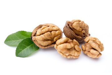 Walnut and walnut kernel isolated on the white background.