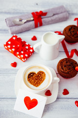 Beautiful morning breakfast for mothers day with coffee, cupcakes and. hearts 
