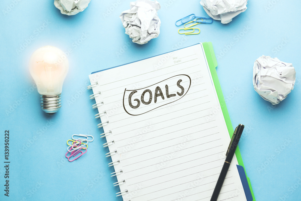 Poster goals text on notebook