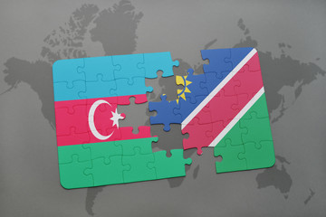 puzzle with the national flag of azerbaijan and namibia on a world map