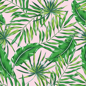 Green palm leaves on the pink background. Vector seamless pattern. Tropical illustration. Jungle foliage.