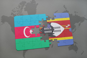 puzzle with the national flag of azerbaijan and swaziland on a world map