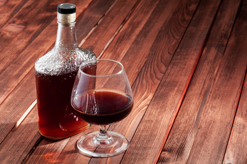 Cognac bottle on a table.