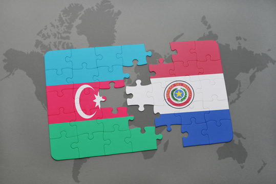 puzzle with the national flag of azerbaijan and paraguay on a world map
