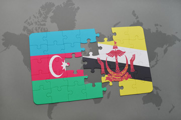 puzzle with the national flag of azerbaijan and brunei on a world map