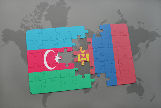 puzzle with the national flag of azerbaijan and mongolia on a world map