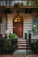 Fototapeta premium an old brick brownstone building