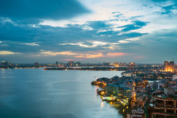 Obraz premium Aerial view of Hanoi skyline at West Lake. Hanoi cityscape at twilight