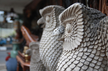 Crafts owl statue, in the antiques market, street Surabaya, Jakarta.