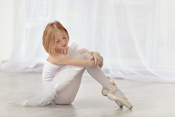 Small ballerina dancer at home © Africa Studio