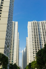 Obraz na płótnie Canvas Resident apartment buildings against blue sky