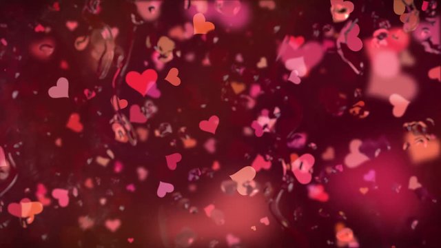 Valentinstag fallende Herzen hinter einer Glasscheibe mit Wassertropfen