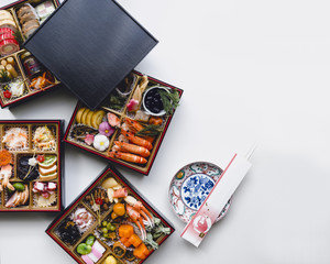 High angle shot of osechi ryori on white background