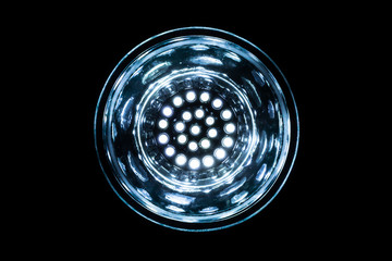 glowing round object with a rotating disc on black background
