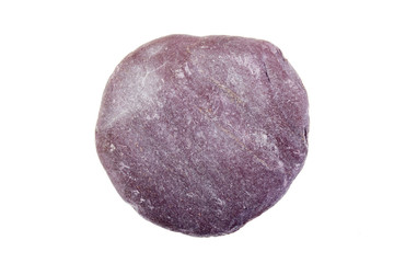 Pebble from beach against a white background