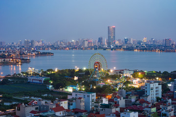 Aerial skyline view of north West Lake. Hanoi cityscape at twilight