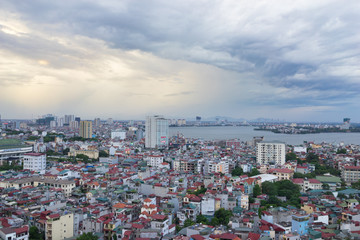 Obraz premium Aerial view of north West lake ( Ho Tay) in Tay Ho district. Hanoi cityscape at twilight