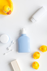 baby accessories for bath with duck on white background