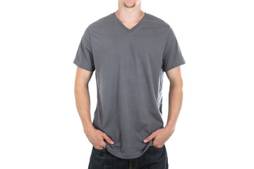 Young man wearing a gray v neck tee shirt