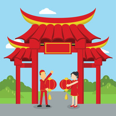 chinese man and chinese woman happy infront. of chinese gate