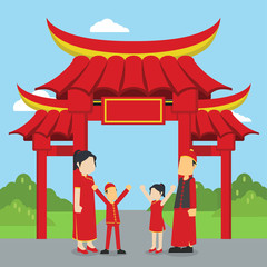 chinese family standing in front of chinese gate