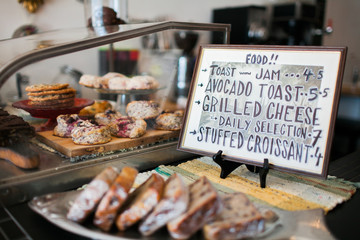 Pastry display and food sign