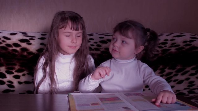 Children reading the book. Full HD