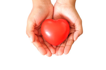 Hand holding red heart on white background