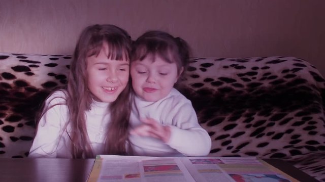 Children reading the book. Full HD
