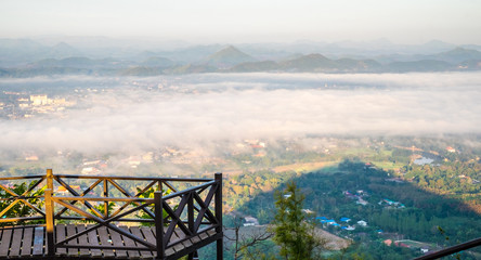 Beautiful Viewpoint for watch Cityscape with Mist. View from top mountain at Phu Bo Bit, Loei Province, Thailand