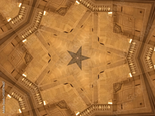 Abstract Of A Ceiling Tile Mirrored To Create A Five Point Star In