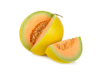 portion cut fresh yellow melon with stem on white background