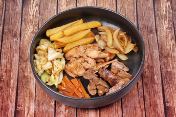 Fried teriyaki chicken with butter potato and herb.