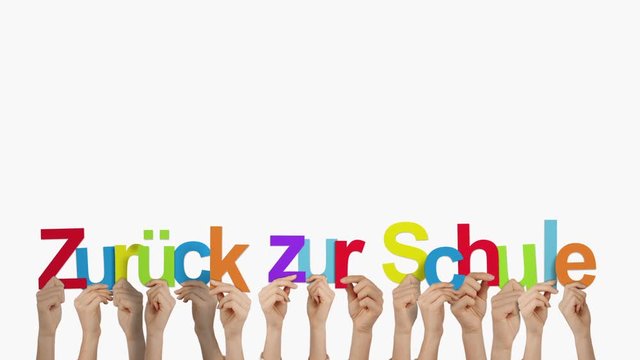 Hands holding up zuruck zur schule
