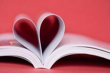 Love concept of heart shape from book pages.