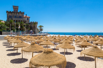 Umbrellas on public beach in Estoril