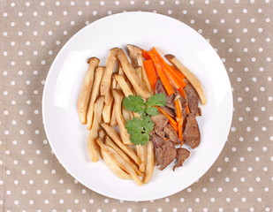 Fried eryngii mushroom with pork liver and carrot.