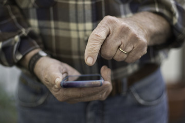 Man Pointing to iPone
