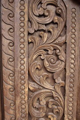 Carved wooden temple in a public place.