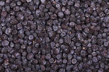 Dried blueberries in plate, close up
