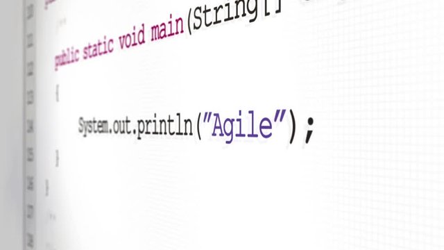 Software code scrolling across the screen revealing software terminology - "Agile"