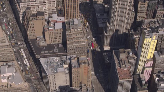 AERIAL: Flying Above Skyscrapers Along Broadway And 6th Ave Towards Bryant Park