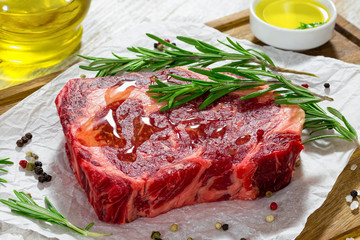  rib eye fresh meat steak on white paper