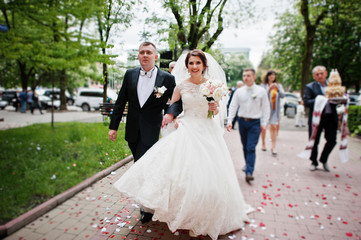 Happy wedding couple went to the registration their marriage