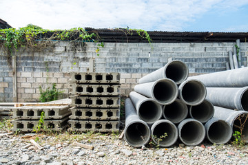 I-shape pile precast concrete and Stacked of concrete drainage pipes for construction