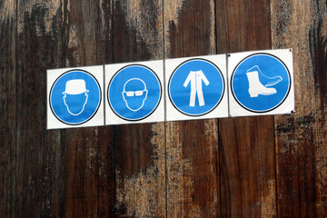 Warning signs prescribing to wear uniform on the facility territory